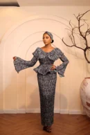 Peacock pleated peplum set by Kandé